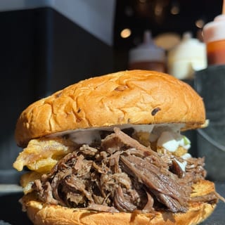 Pot Roast Sandwich on an Onion Roll