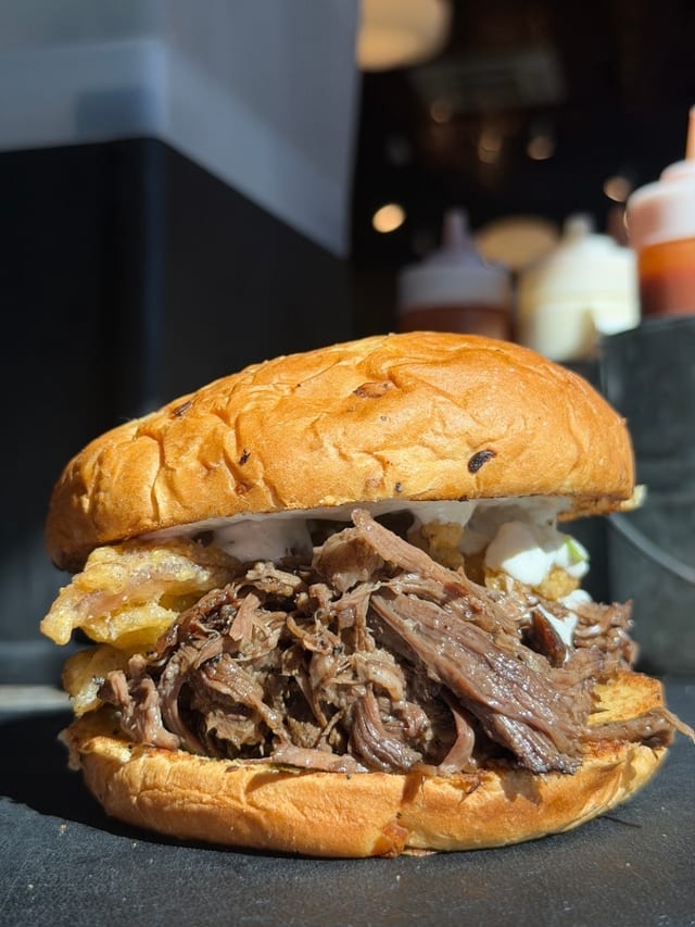 Pot Roast Sandwich on an Onion Roll.